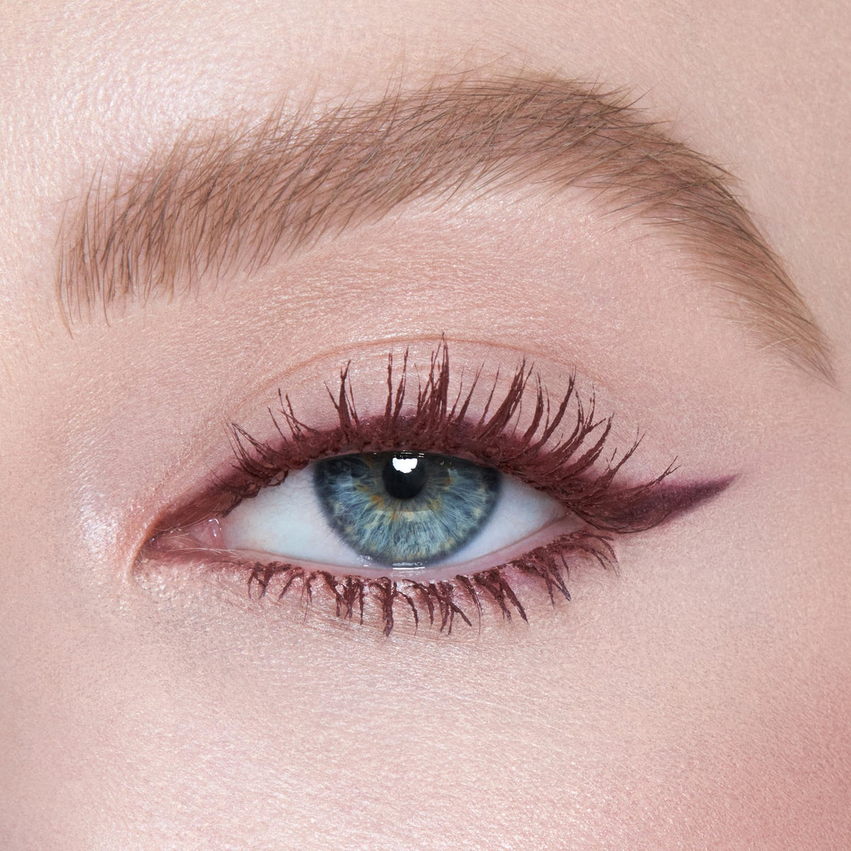 Charlotte Tilbury Pillow Talk texture swatch displaying blendable berry-brown finish