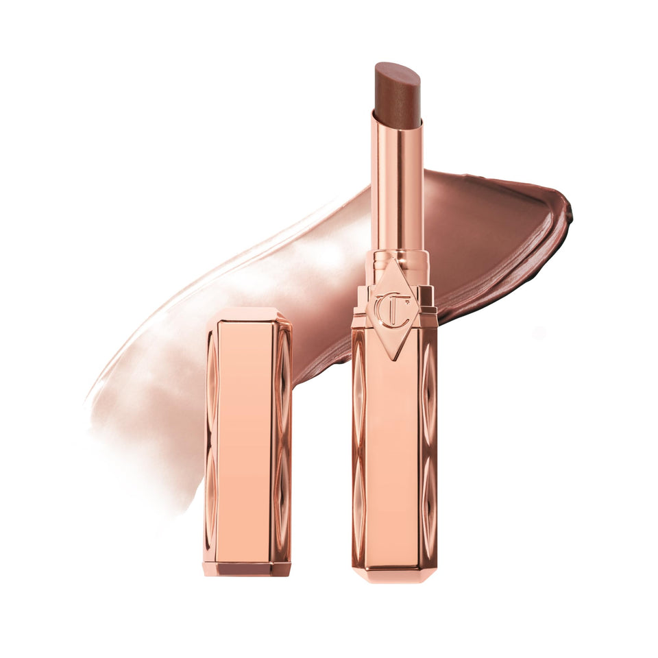 Charlotte Tilbury front closed product shot showing sleek packaging and easy carry benefit