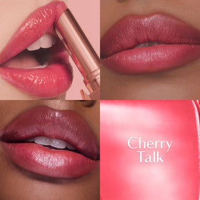 Charlotte Tilbury lip application in lifestyle setting showing natural cherry-tint enhancement