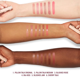 Charlotte Tilbury scale view in hand, conveys size and easy handbag portability