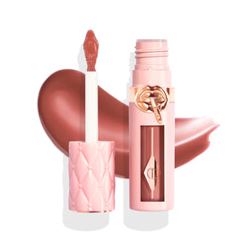 Charlotte Tilbury Plumpgasm front packaging showing glossy tube and shade