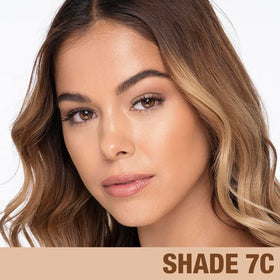 Charlotte Tilbury product staged on vanity conveying everyday skincare-makeup routine