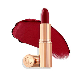 Charlotte Tilbury front tube view showing elegant case and red shade benefit