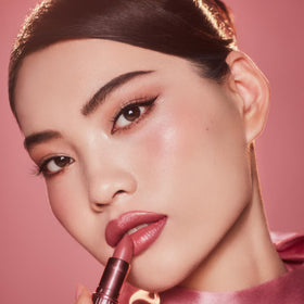 Charlotte Tilbury tube opened to reveal label and premium metallic casing