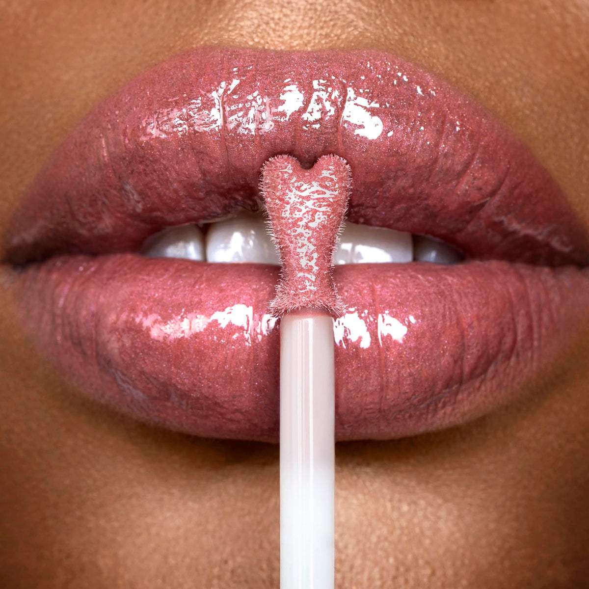 Charlotte Tilbury rosy glow tube next to a ruler showing 7.9ml size
