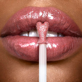 Charlotte Tilbury rosy glow tube next to a ruler showing 7.9ml size