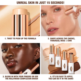 Charlotte Tilbury foundation stick held in hand to show compact travel-friendly size