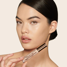Charlotte Tilbury swatch on arm of shade 5 Medium demonstrating natural medium coverage