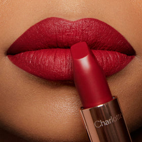 Charlotte Tilbury red carpet red swatch on skin showing true color benefit