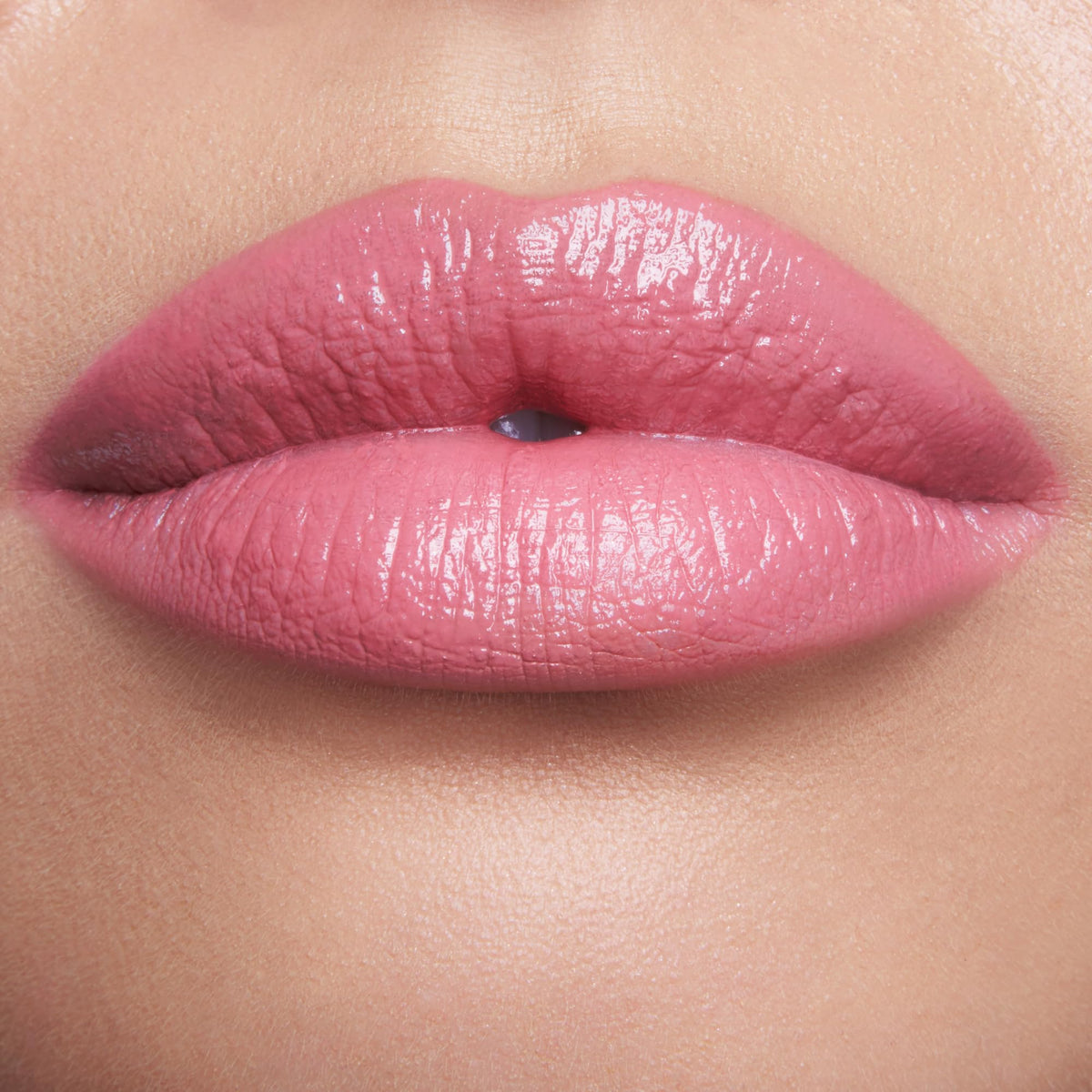 Charlotte Tilbury close-up of creamy texture and satin sheen to show moisturizing finish and light-diffusing pigments