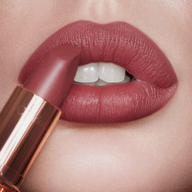Charlotte Tilbury texture swatch on arm showing smooth, buildable color payoff