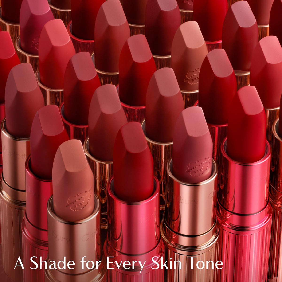 Charlotte Tilbury lipstick tube open beside cap highlighting premium finish