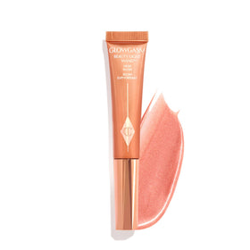 Charlotte Tilbury front packaging showing wand and peachy glow benefit