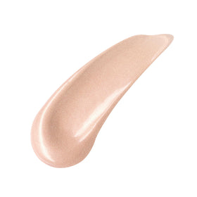 Charlotte Tilbury application in hand demonstrating lightweight spreadability benefit