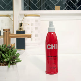CHI 44 close-up mist demonstrating fine spray for even heat protection