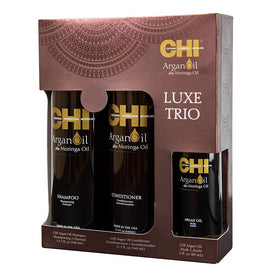 CHI moringa oil in use applied to hair ends delivering shine and frizz control