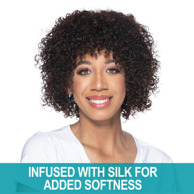 CHI conditioner being applied to wet curls for smoother detangling