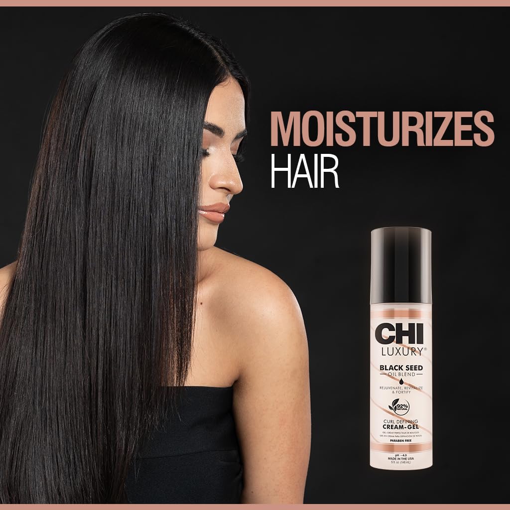 CHI styling in use scrunching damp hair to define natural curls