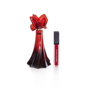 Christian Siriano lip gloss in use adding shine and complementing scent