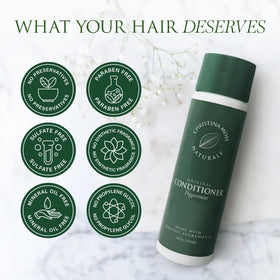 Christina Moss Naturals being applied to hair for detangling benefit