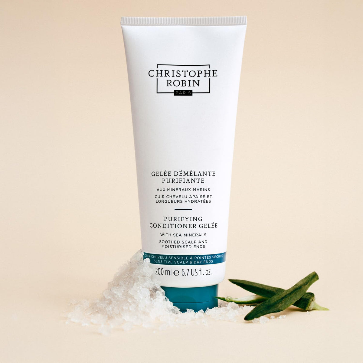 Christophe Robin gelée being applied to hair lengths, detangles and hydrates