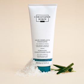 Christophe Robin gelée being applied to hair lengths, detangles and hydrates