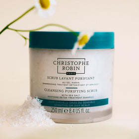 Christophe Robin scrub applied to scalp showing targeted detox and cleansing