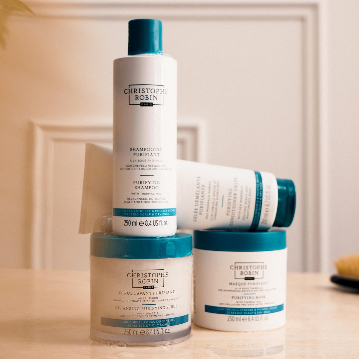 Christophe Robin jar on bathroom shelf suggesting weekly spa-like routine