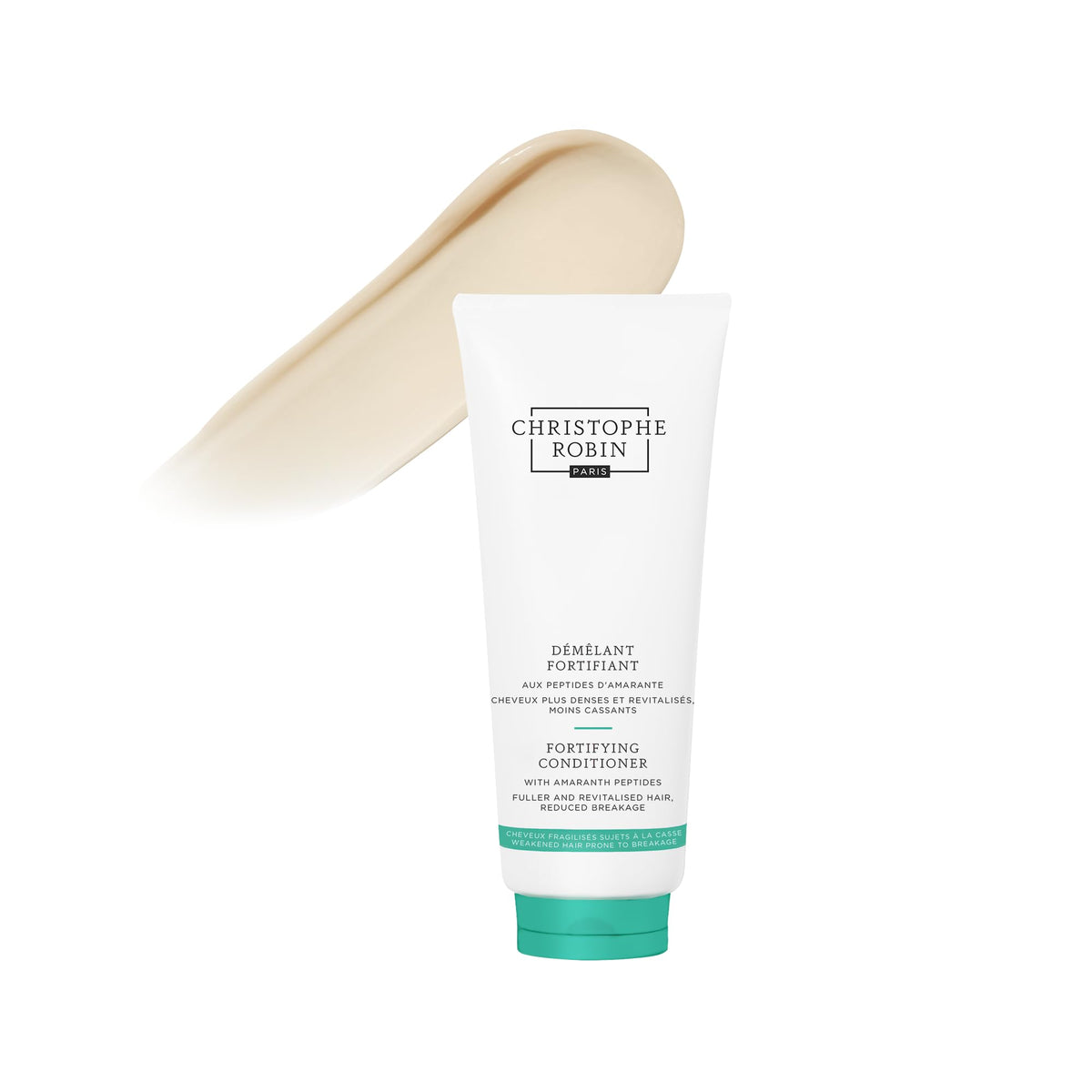 Christophe Robin cream texture on fingertips, shows rich conditioning and easy spreadability