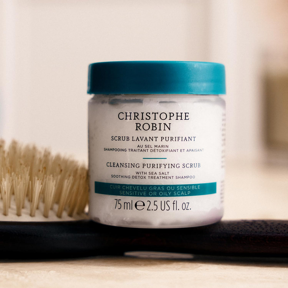 Christophe Robin scalp massage with fingertips reducing buildup and soothing scalp benefit