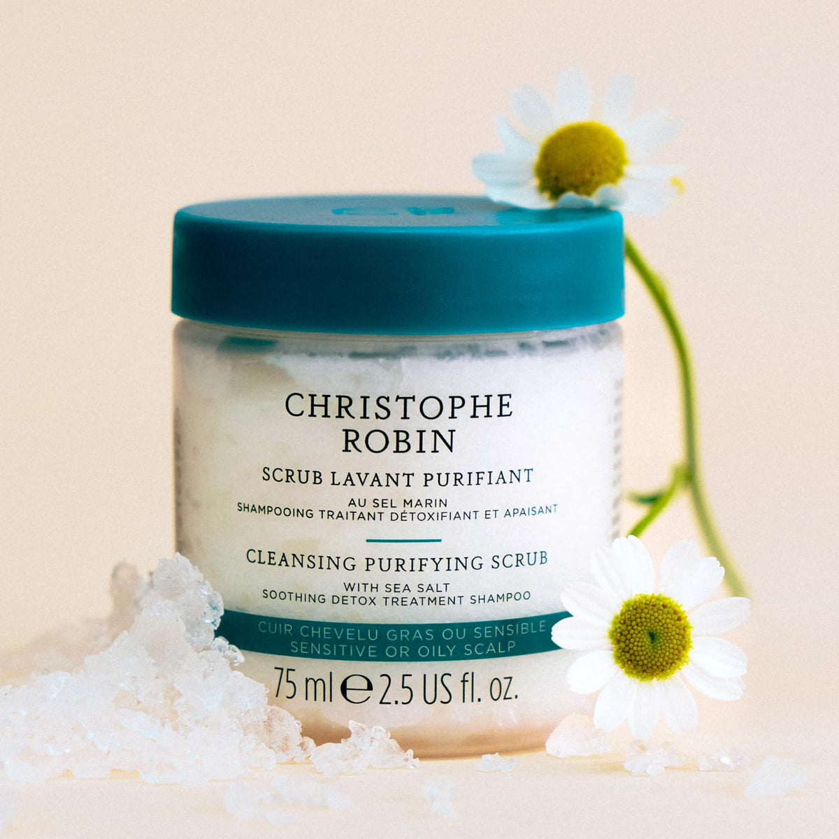 Christophe Robin scrub in hands during application demonstrating easy spread benefit