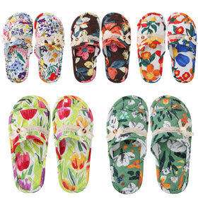 Chuarry front view of five-pair slipper set showing floral designs and convenience