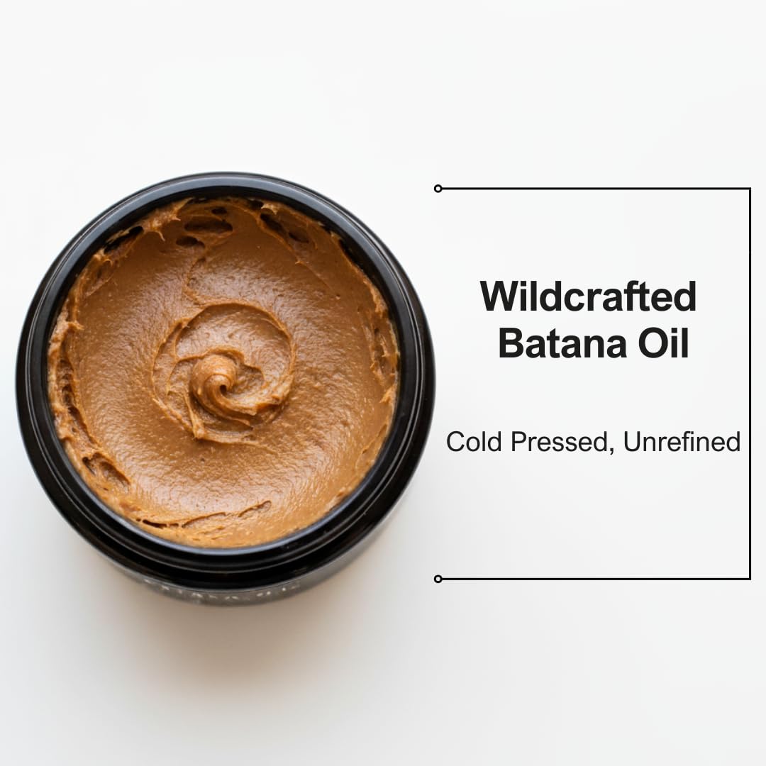 CinNoir Batana oil being massaged into scalp for deep nourishment