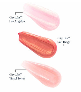 City Beauty City Lips held in hand to show size and portability benefit