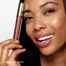 City Beauty City Lips texture swipe revealing glossy finish and hydrating sheen