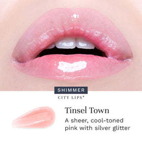 City Beauty swatch on skin revealing cool pink shimmer and instant radiance