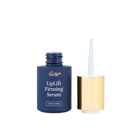 City Beauty bottle next to everyday items showing size comparison