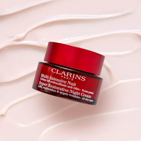Clarins 1.7 oz scale comparison beside common item benefit: clear size reference
