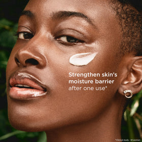 Clarins cream spread on hand demonstrating coverage and easy application