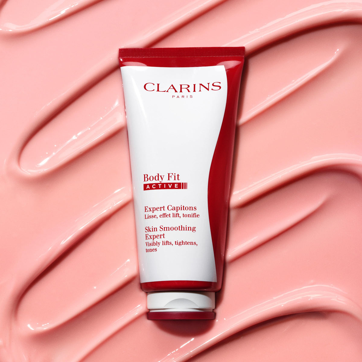 CLARINS hands applying gel-cream upward strokes to refine body contours