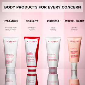 Clarins Body Partner plant extracts and botanicals display emphasizing natural ingredient benefit