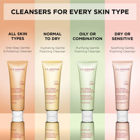 Clarins cleanser bottle with water droplets highlighting refreshing finish