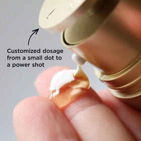 Clarins 0.6 oz size compared with a coin for scale and travel-friendly convenience