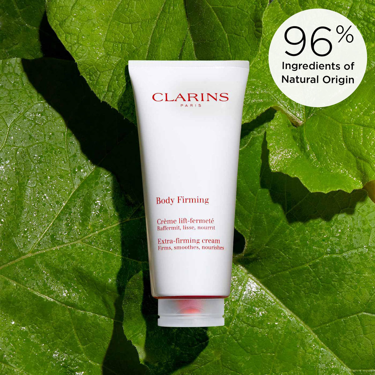Clarins tube beside a hand for scale indicating convenient 6.6 ounce size