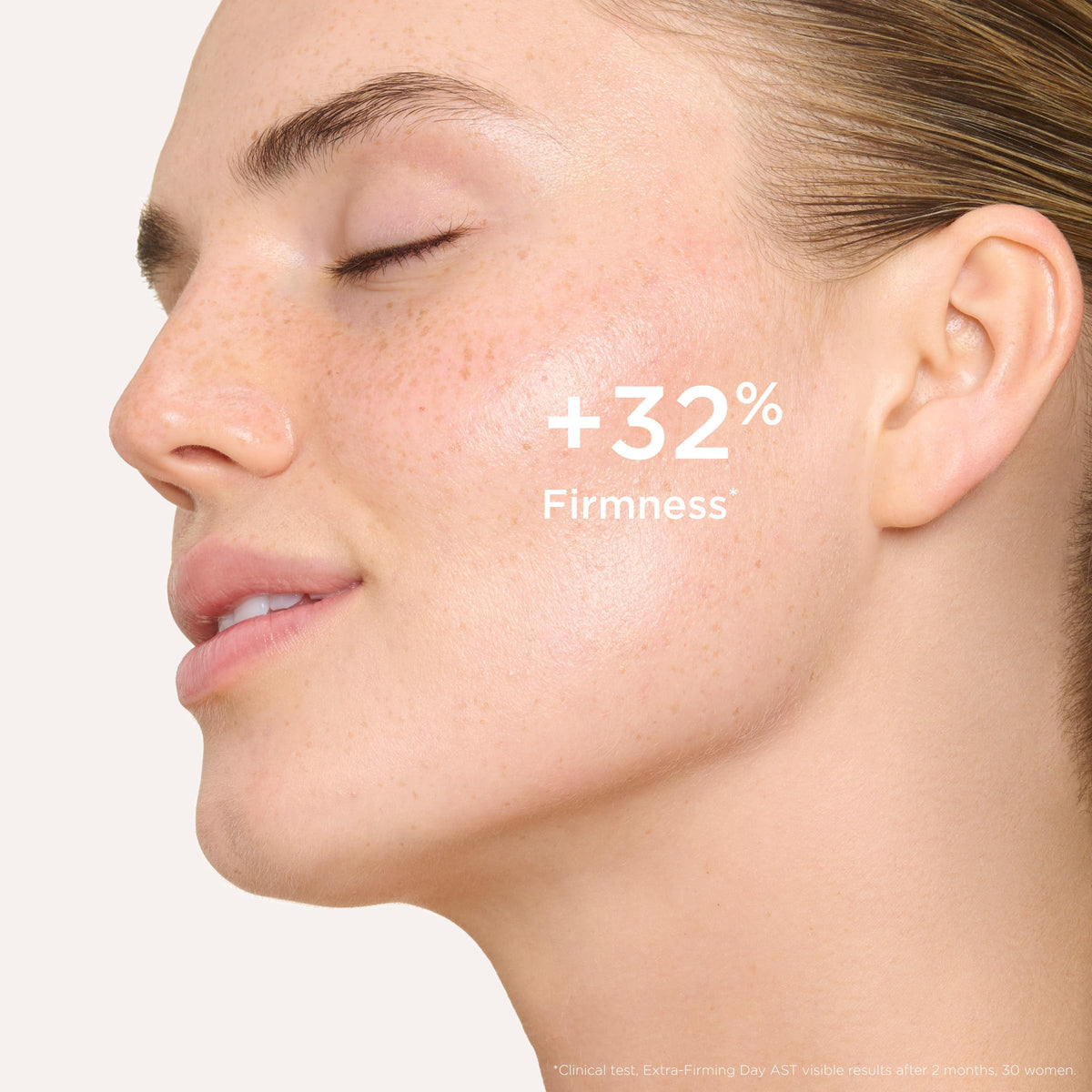 CLARINS applying cream to face in morning routine for firmer looking skin