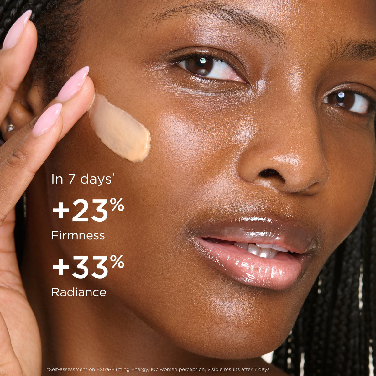 Clarins product beside red ginseng root highlighting energizing ingredient