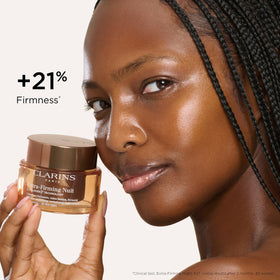 Clarins night cream spread on hand to show moisturizing finish and quick absorption benefit