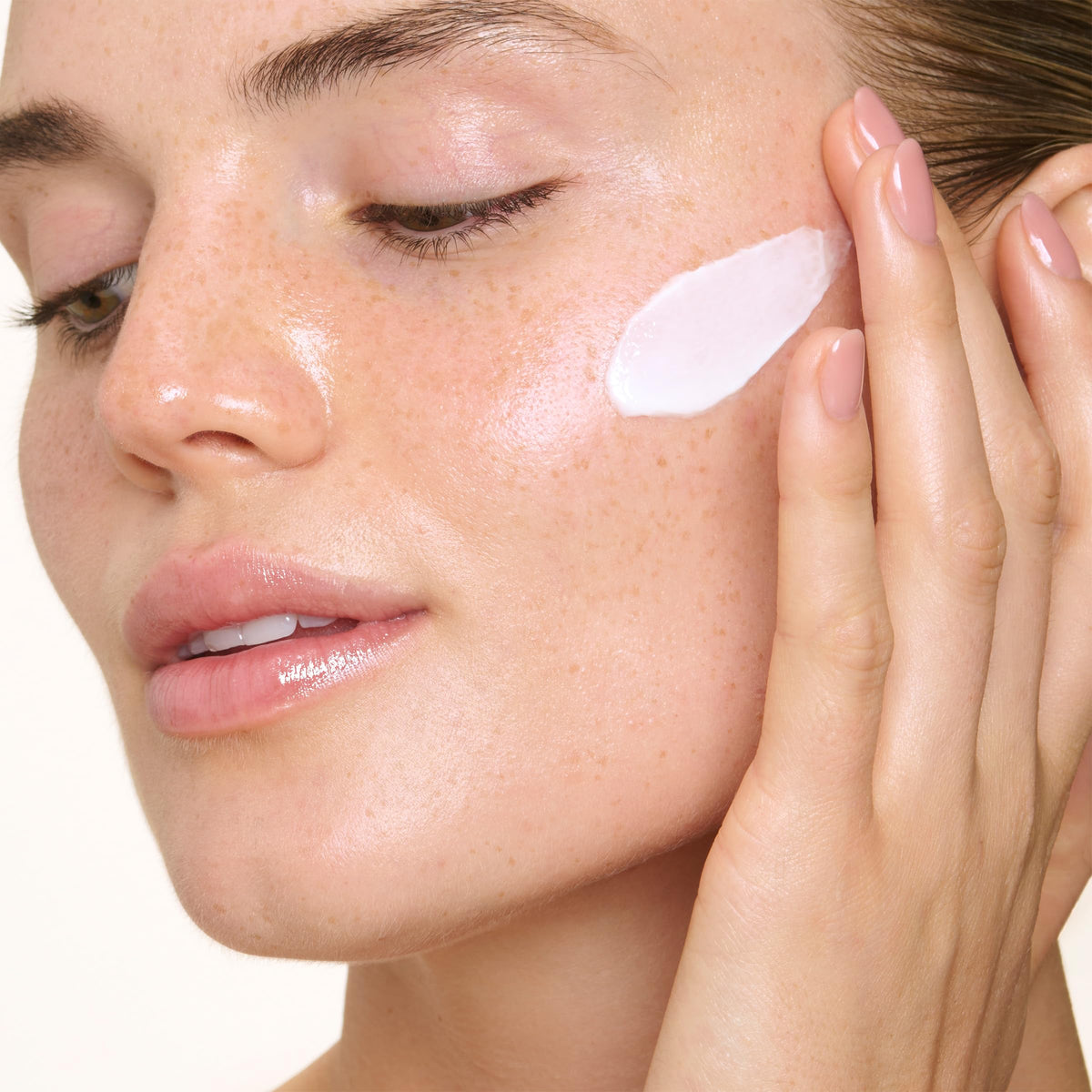 Clarins ingredient display with avocado and peptides illustrating active formulation benefit