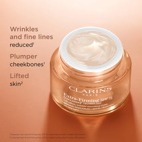 Clarins close-up cream texture highlighting rich yet lightweight feel for smooth application