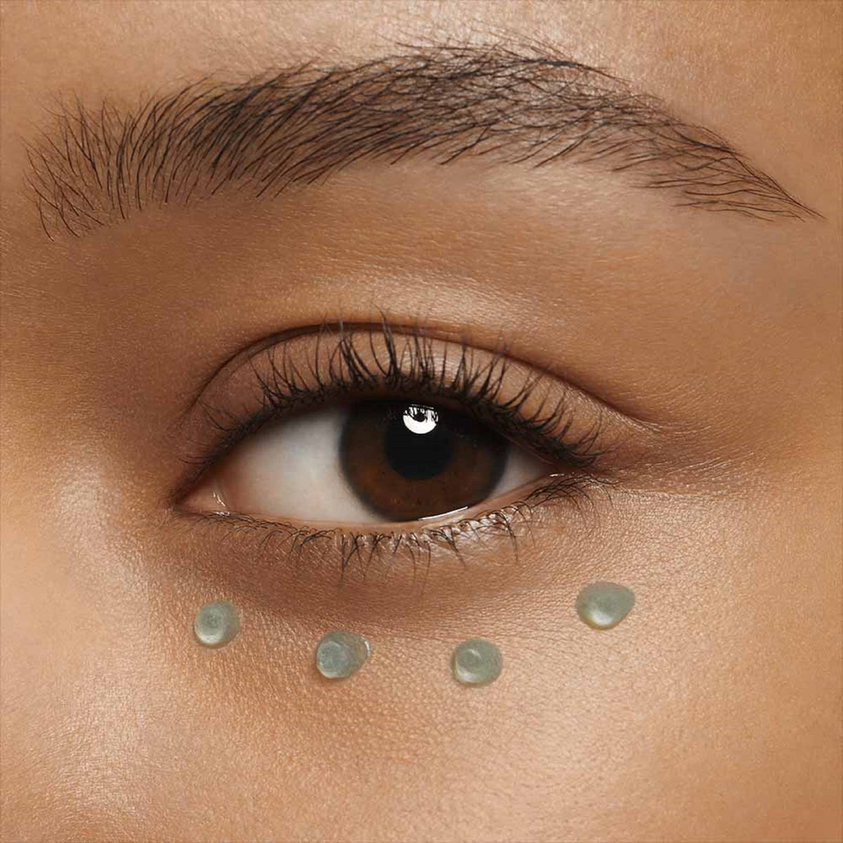 CLARINS under-eye result comparison showing reduced puffiness and refreshed appearance